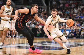 Mar 22, 2026; St. Louis, MO, USA; Purdue Boilermakers guard Braden Smith (3) drives against Miami Hurricanes guard Dante Allen (35) during the first half during a second round game of the men's 2026 NCAA Tournament at Enterprise Center. Mandatory Credit: Jeff Le-Imagn Images