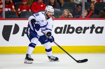 Mar 22, 2026; Calgary, Alberta, CAN; Tampa Bay Lightning right wing Nikita Kucherov (86) skates with the puck against the Calgary Flames during the third period at Scotiabank Saddledome. Mandatory Credit: Sergei Belski-Imagn Images