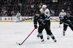 Mar 22, 2026; Salt Lake City, Utah, USA; Utah Mammoth right wing Clayton Keller (9) skates with the puck against Los Angeles Kings left wing Trevor Moore (12) during the third period at Delta Center. Mandatory Credit: Rob Gray-Imagn Images