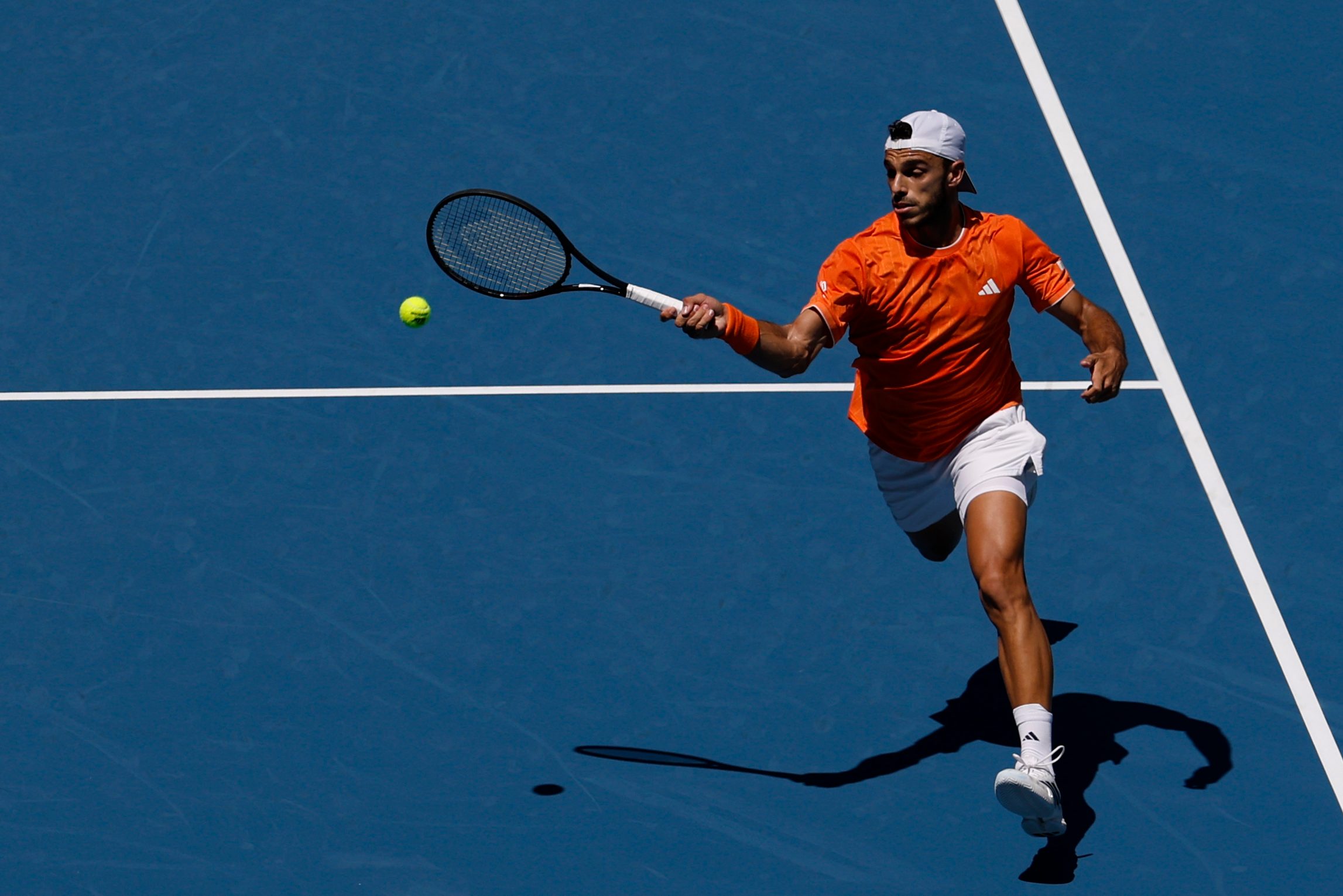 Mar 23, 2026; Miami Gardens, FL, USA; Francisco Cerundolo (ARG) hits a forehand against Daniil Medvedev (not pictured) on day 7 of the 2026 Miami Open at Hard Rock Stadium. Mandatory Credit: Geoff Burke-Imagn Images