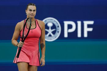 Mar 23, 2026; Miami Gardens, FL, USA; Aryna Sabalenka reacts after match point against Qinwen Zheng (CHN) (not pictured) on day 7 of the 2026 Miami Open at Hard Rock Stadium. Mandatory Credit: Geoff Burke-Imagn Images