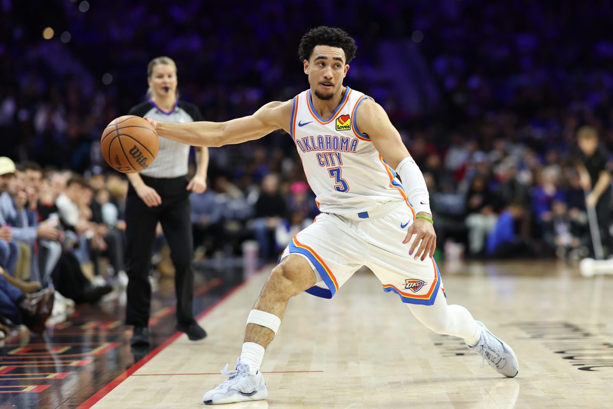 Mar 23, 2026; Philadelphia, Pennsylvania, USA; Oklahoma City Thunder guard Jared McCain (3) controls the ball against the Philadelphia 76ers during the fourth quarter at Xfinity Mobile Arena. Mandatory Credit: Bill Streicher-Imagn Images