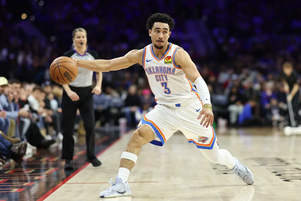 Mar 23, 2026; Philadelphia, Pennsylvania, USA; Oklahoma City Thunder guard Jared McCain (3) controls the ball against the Philadelphia 76ers during the fourth quarter at Xfinity Mobile Arena. Mandatory Credit: Bill Streicher-Imagn Images