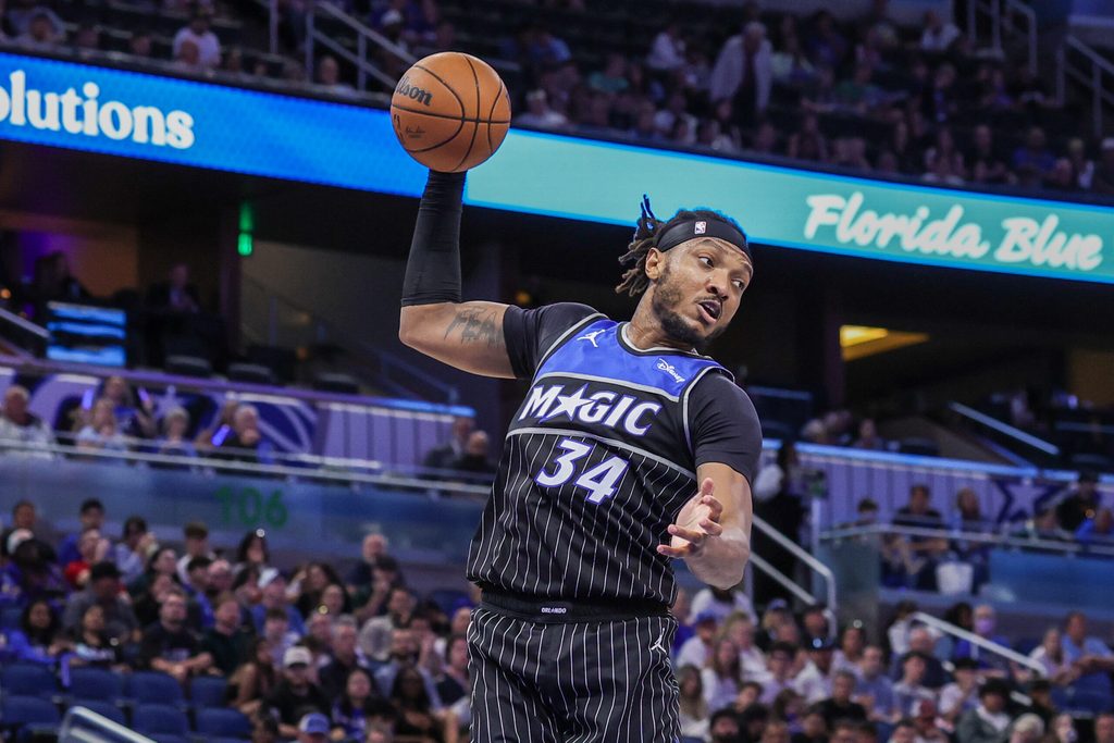 Mar 23, 2026; Orlando, Florida, USA; Orlando Magic center Wendell Carter Jr. (34) grabs the rebound during the second half against the Indiana Pacers at Kia Center. Mandatory Credit: Mike Watters-Imagn Images