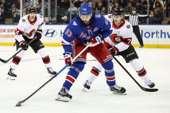 Mar 23, 2026; New York, New York, USA;  New York Rangers center Mika Zibanejad (93) controls the puck in the third period against the Ottawa Senators at Madison Square Garden. Mandatory Credit: Wendell Cruz-Imagn Images