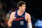 Mar 23, 2026; Inglewood, California, USA; Los Angeles Clippers center Brook Lopez (11) gestures after scoring during the second half against the Milwaukee Bucks at Intuit Dome. Mandatory Credit: William Liang-Imagn Images