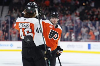 Mar 24, 2026; Philadelphia, Pennsylvania, USA; Philadelphia Flyers defenseman Jamie Drysdale (9) celebrates with center Trevor Zegras (46) after scoring a goal against the Columbus Blue Jackets in the third period at Xfinity Mobile Arena. Mandatory Credit: Kyle Ross-Imagn Images