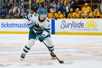 Mar 24, 2026; Nashville, Tennessee, USA;  San Jose Sharks center Macklin Celebrini (71) skates with the puck against the Nashville Predators during the second period at Bridgestone Arena. Mandatory Credit: Steve Roberts-Imagn Images