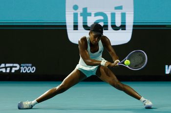 Mar 24, 2026; Miami Gardens, FL, USA; Coco Gauff (USA) hits a backhand against Belinda Bencic (SUI) (not pictured) on day eight of the 2026 Miami Open at Hard Rock Stadium. Mandatory Credit: Geoff Burke-Imagn Images