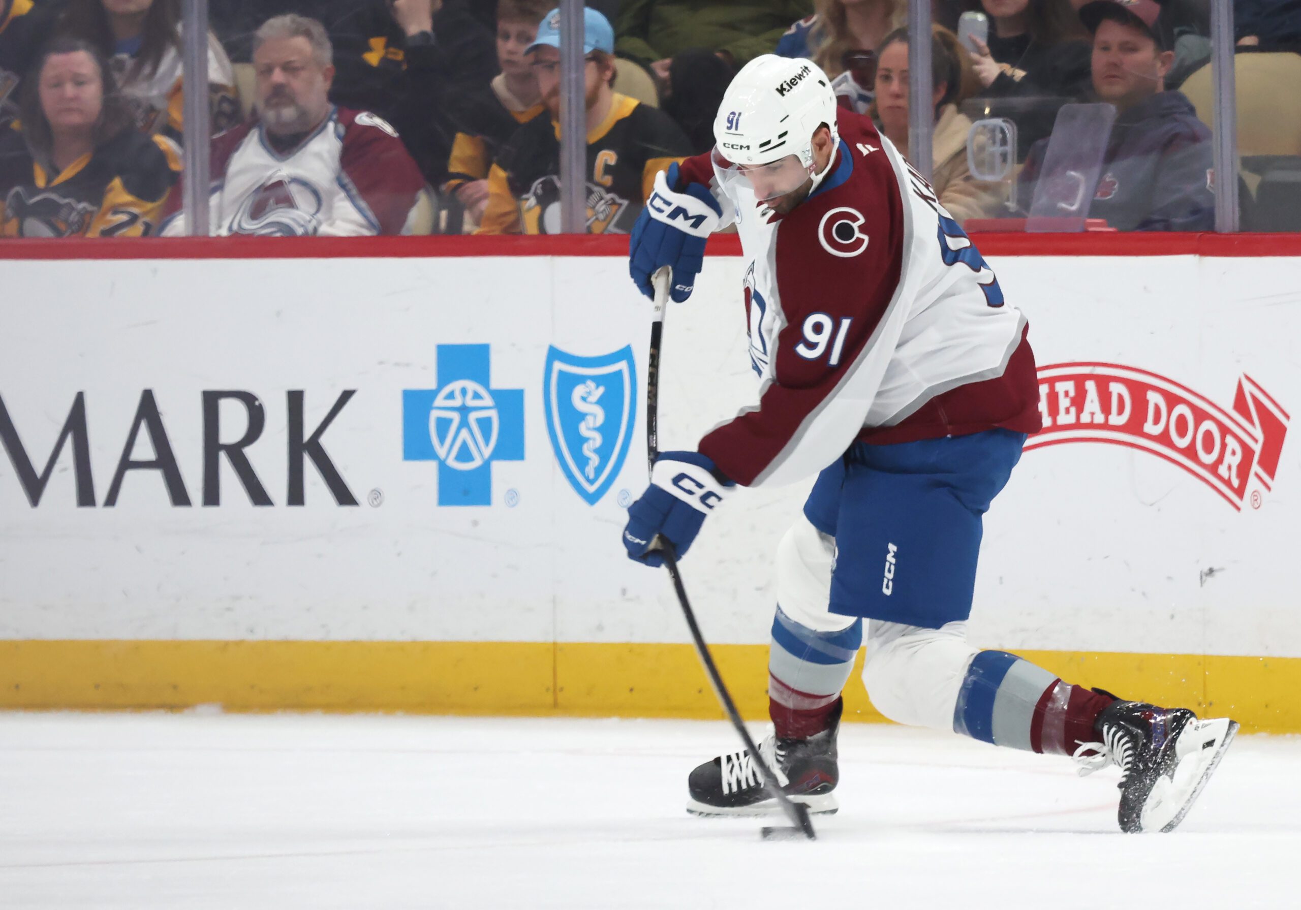 Mar 24, 2026; Pittsburgh, Pennsylvania, USA;  Colorado Avalanche center Nazem Kadri (91) shoots the puck against the Pittsburgh Penguins during the third period at PPG Paints Arena. Mandatory Credit: Charles LeClaire-Imagn Images
