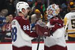 Mar 24, 2026; Pittsburgh, Pennsylvania, USA;  Colorado Avalanche center Martin Necas (88) and goaltender Scott Wedgewood (41) celebrate after defeating the Pittsburgh Penguins  at PPG Paints Arena. Mandatory Credit: Charles LeClaire-Imagn Images