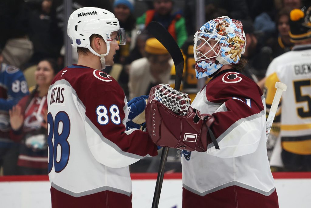 Mar 24, 2026; Pittsburgh, Pennsylvania, USA; Colorado Avalanche center Martin Necas (88) and goaltender Scott Wedgewood (41) celebrate after defeating the Pittsburgh Penguins at PPG Paints Arena. Mandatory Credit: Charles LeClaire-Imagn Images