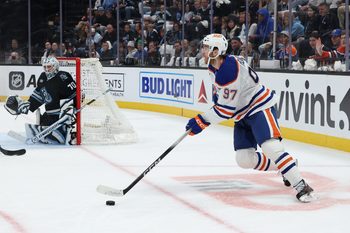 Mar 24, 2026; Salt Lake City, Utah, USA; Edmonton Oilers center Connor McDavid (97) looks to pass against the Utah Mammoth during the second period at Delta Center. Mandatory Credit: Rob Gray-Imagn Images