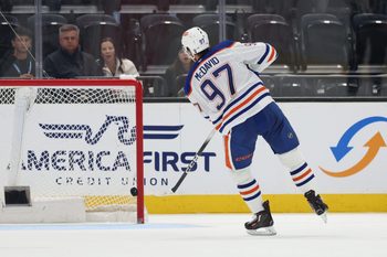 Mar 24, 2026; Salt Lake City, Utah, USA; Edmonton Oilers center Connor McDavid (97) scores a goal on an open net during the third period of a game against the Utah Mammoth at Delta Center. Mandatory Credit: Rob Gray-Imagn Images