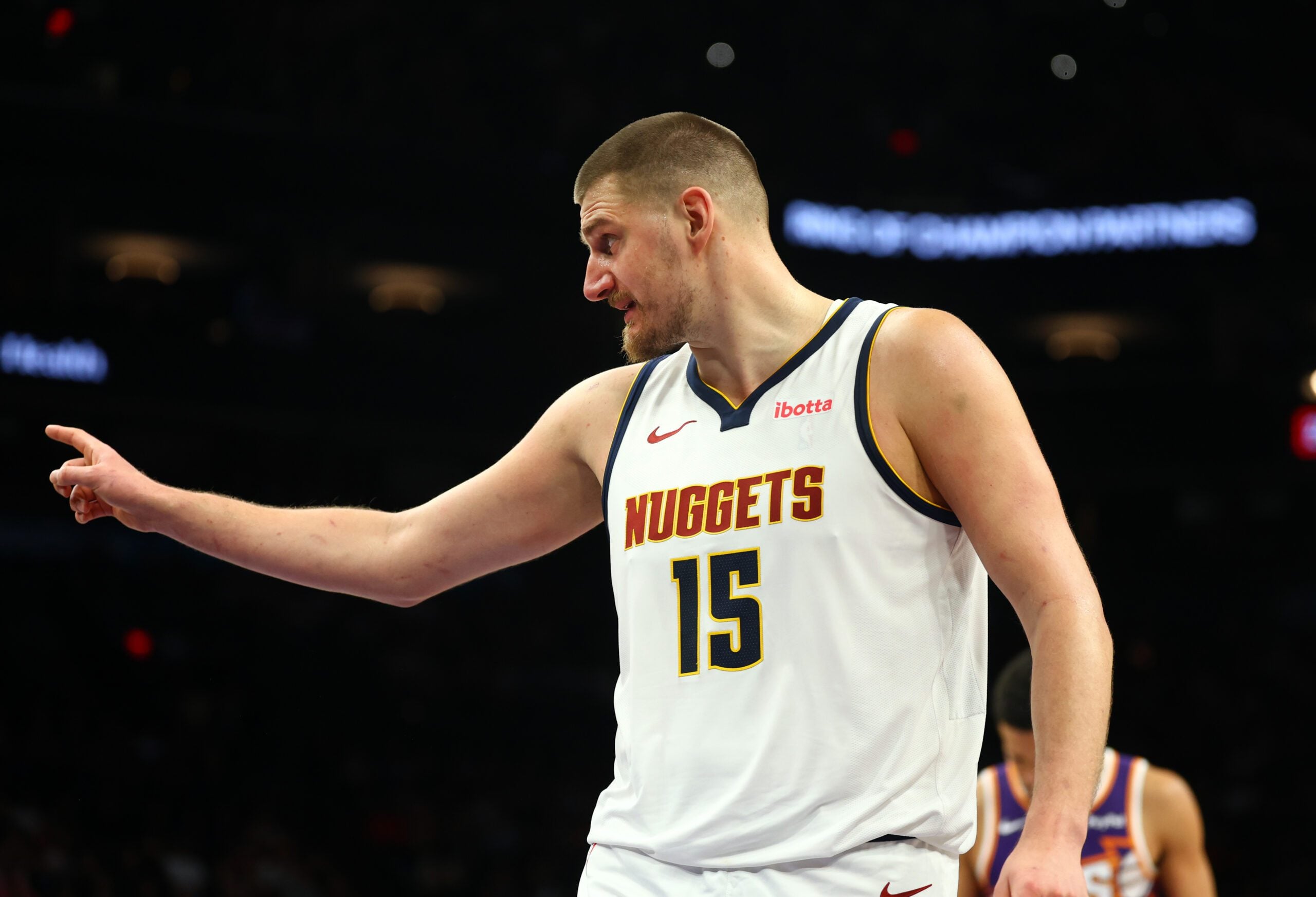 Mar 24, 2026; Phoenix, Arizona, USA; Denver Nuggets center Nikola Jokic (15) reacts against the Phoenix Suns in the second half at Mortgage Matchup Center. Mandatory Credit: Mark J. Rebilas-Imagn Images