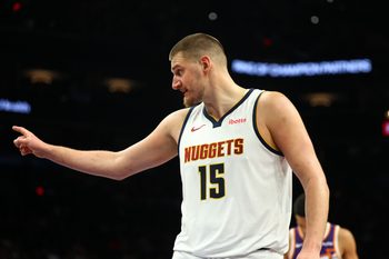Mar 24, 2026; Phoenix, Arizona, USA; Denver Nuggets center Nikola Jokic (15) reacts against the Phoenix Suns in the second half at Mortgage Matchup Center. Mandatory Credit: Mark J. Rebilas-Imagn Images