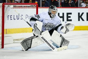 Mar 24, 2026; Calgary, Alberta, CAN; Los Angeles Kings goaltender Darcy Kuemper (35) guards his net against the Calgary Flames during the overtime period at Scotiabank Saddledome. Mandatory Credit: Sergei Belski-Imagn Images
