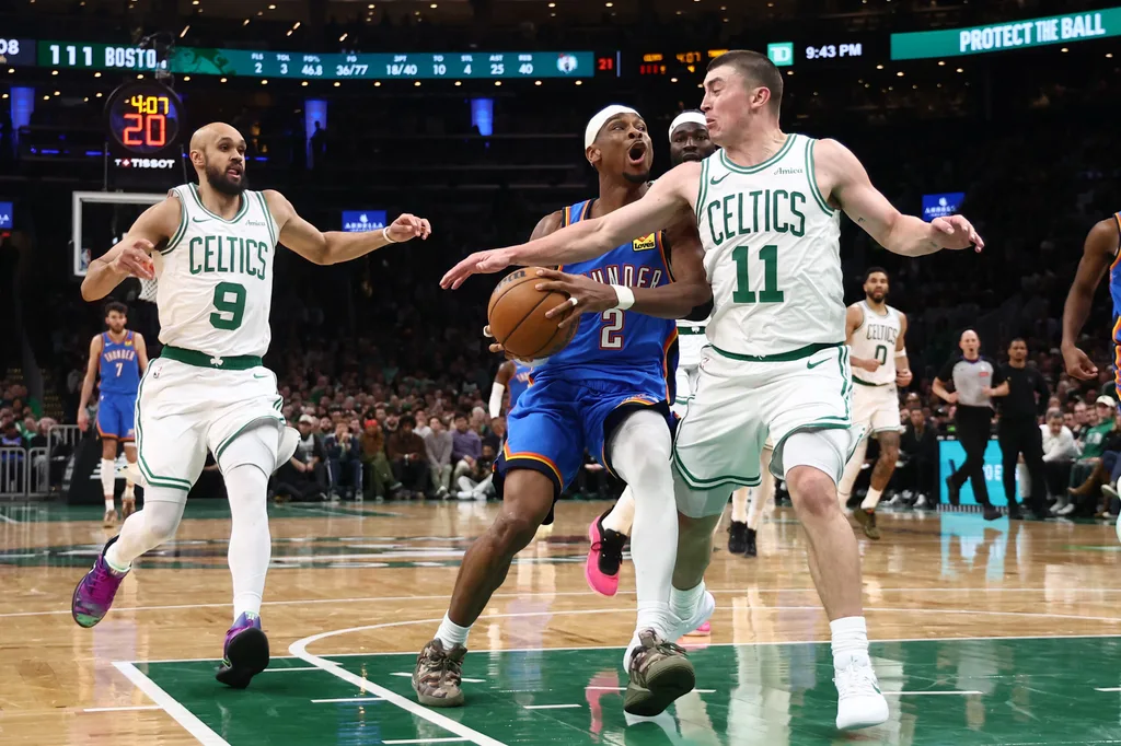 Mar 25, 2026; Boston, Massachusetts, USA; Oklahoma City Thunder guard Shai Gilgeous-Alexander (2) can’t get past Boston Celtics guard Payton Pritchard (11) during the fourth quarter at TD Garden. Mandatory Credit: Winslow Townson-Imagn Images