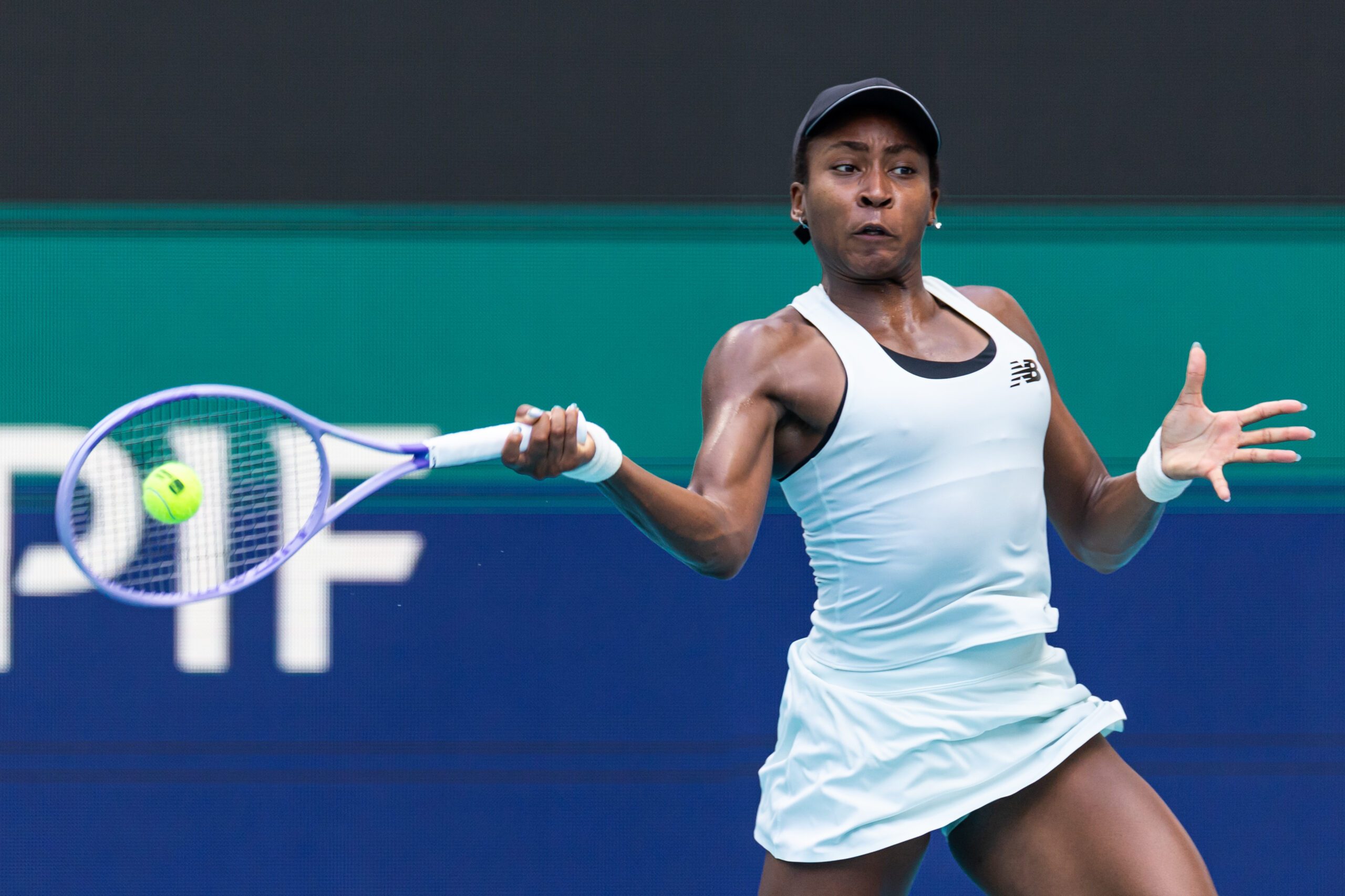 Mar 26, 2026; Miami Gardens, FL, USA; Coco Gauff of the United States hits a shot against Karolina Muchova of the Czech Republic in the semi-finals of the women’s singles at the Miami Open at the Hard Rock Stadium. Mandatory Credit: Mike Frey-Imagn Images