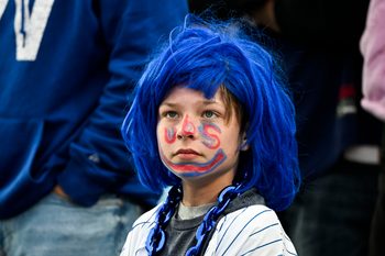 Mar 26, 2026; Chicago, Illinois, USA;  A Chicago Cubs fan during the seventh inning against the Washington Nationals at Wrigley Field. Mandatory Credit: Matt Marton-Imagn Images
