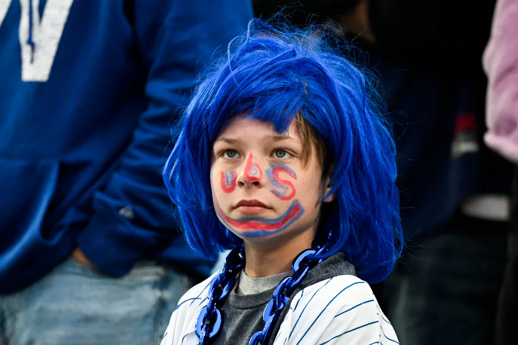 Mar 26, 2026; Chicago, Illinois, USA; A Chicago Cubs fan during the seventh inning against the Washington Nationals at Wrigley Field. Mandatory Credit: Matt Marton-Imagn Images