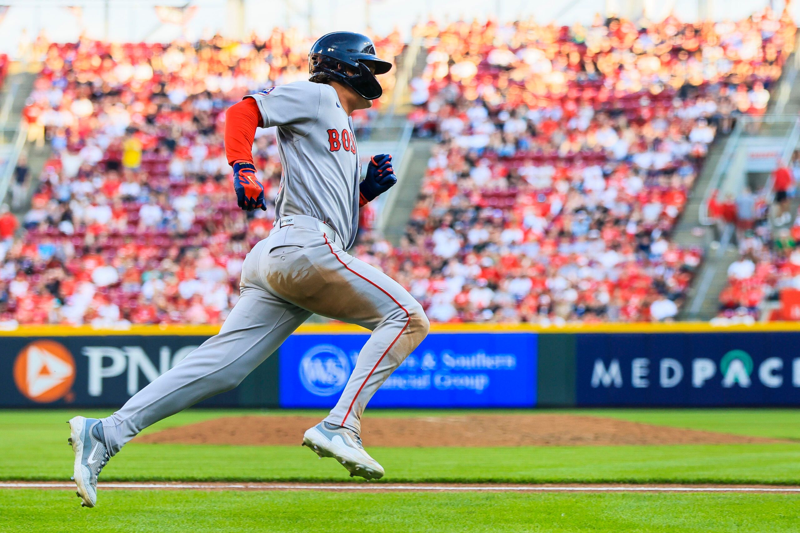 Mar 26, 2026; Cincinnati, Ohio, USA; Boston Red Sox left fielder Roman Anthony (19) scores on a RBI single hit by designated hitter Jarren Duran (not pictured) in the ninth inning against the Cincinnati Reds at Great American Ball Park. Mandatory Credit: Katie Stratman-Imagn Images