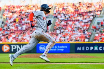 Mar 26, 2026; Cincinnati, Ohio, USA; Boston Red Sox left fielder Roman Anthony (19) scores on a RBI single hit by designated hitter Jarren Duran (not pictured) in the ninth inning against the Cincinnati Reds at Great American Ball Park. Mandatory Credit: Katie Stratman-Imagn Images