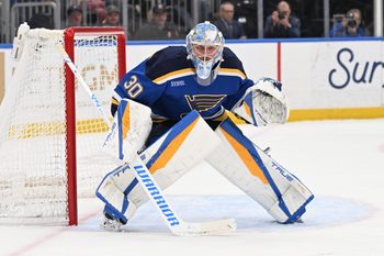 Mar 26, 2026; St. Louis, Missouri, USA; St. Louis Blues goaltender Joel Hofer (30) defends the net against the San Jose Sharks in the first period at Enterprise Center. Mandatory Credit: Joe Puetz-Imagn Images