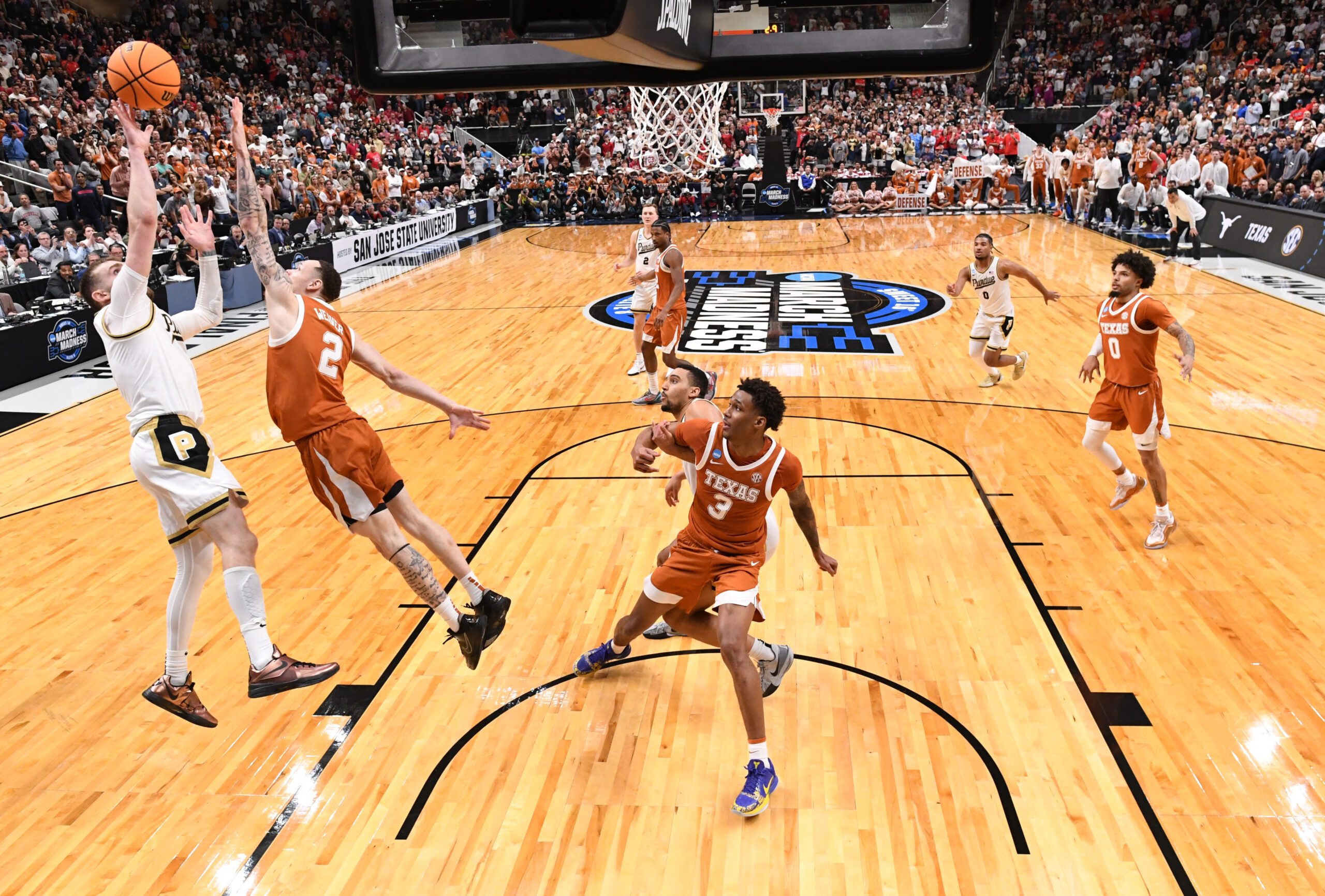 Mar 26, 2026; San Jose, CA, USA; Purdue Boilermakers guard Braden Smith (3) shoots over Texas Longhorns guard Chendall Weaver (2) in the second half during a Sweet Sixteen game of the West Regional of the men's 2026 NCAA Tournament at SAP Center. Mandatory Credit: Eakin Howard-Imagn Images