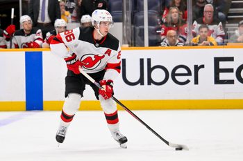 Mar 26, 2026; Nashville, Tennessee, USA;  New Jersey Devils center Jack Hughes (86) skates with the puck against the New Jersey Devils during the second period at Bridgestone Arena. Mandatory Credit: Steve Roberts-Imagn Images