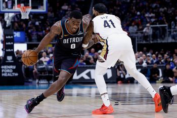 Mar 26, 2026; Detroit, Michigan, USA;  Detroit Pistons center Jalen Duren (0) is defended by New Orleans Pelicans guard Saddiq Bey (41) in the second half at Little Caesars Arena. Mandatory Credit: Rick Osentoski-Imagn Images