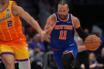Mar 26, 2026; Charlotte, North Carolina, USA;  New York Knicks guard Jalen Brunson (11) brings the ball up court against the Charlotte Hornets during the second half at the Spectrum Center. Mandatory Credit: Jim Dedmon-Imagn Images