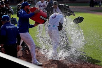 Mar 26, 2026; New York City, New York, USA; New York Mets starting pitcher Sean Manaea (59) dumps water on right fielder Carson Benge (3) during a post game interview after defeating the Pittsburgh Pirates at Citi Field. Mandatory Credit: Brad Penner-Imagn Images