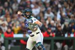Mar 26, 2026; Seattle, Washington, USA; Seattle Mariners catcher Cal Raleigh (29) throws the ball to first base during the first inning against the Cleveland Guardians at T-Mobile Park. Mandatory Credit: Steven Bisig-Imagn Images