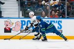 Mar 26, 2026; Vancouver, British Columbia, CAN; Los Angeles Kings defenseman Brandt Clarke (92) drives past Vancouver Canucks forward Teddy Blueger (53) in the first period at Rogers Arena. Mandatory Credit: Bob Frid-Imagn Images