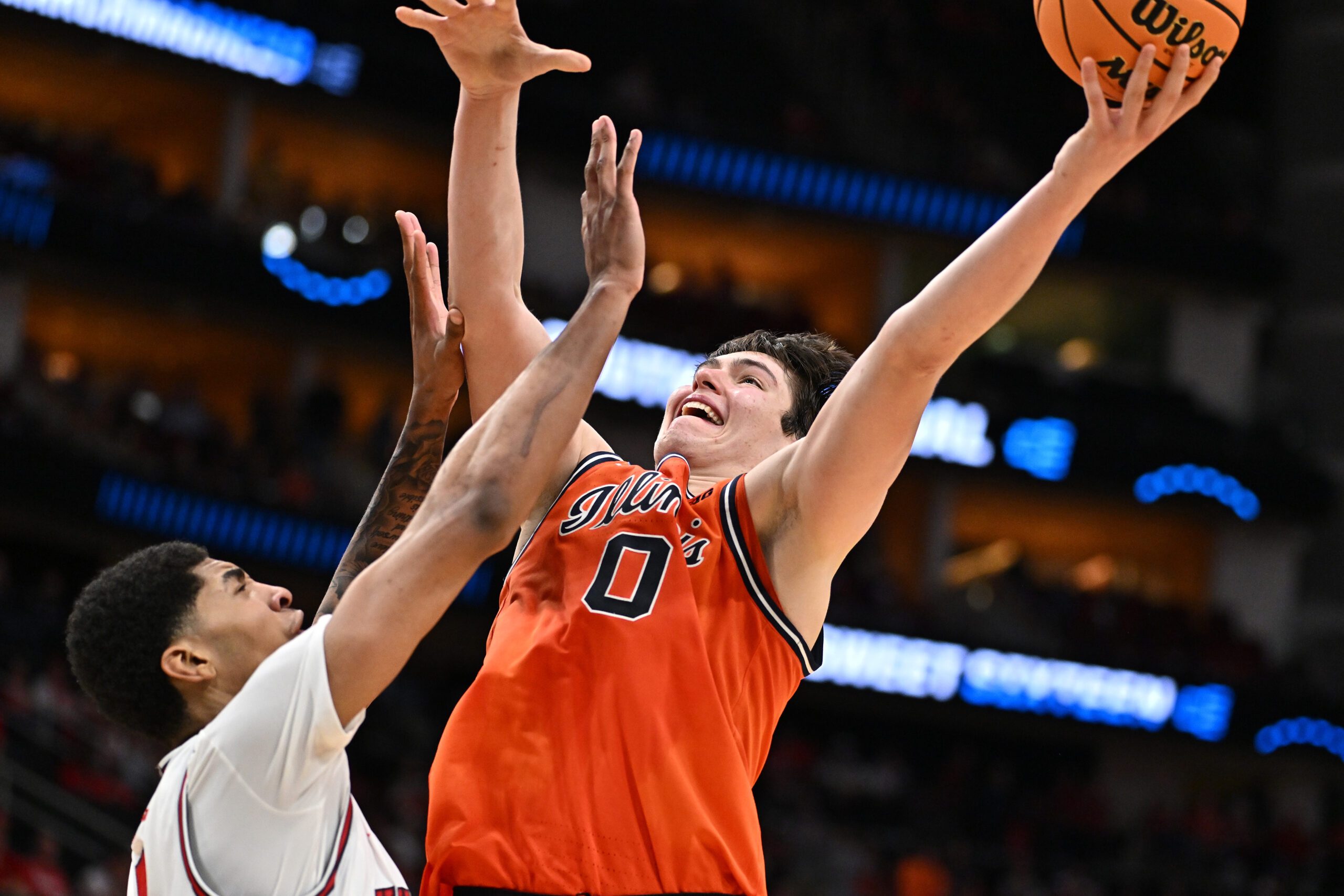 Mar 26, 2026; Houston, TX, USA; Illinois Fighting Illini forward David Mirkovic (0) shoots the ball against Houston Cougars center Chris Cenac Jr. (5) in the second half during a Sweet Sixteen game of the South Regional of the men's 2026 NCAA Tournament at Toyota Center. Mandatory Credit: Maria Lysaker-Imagn Images