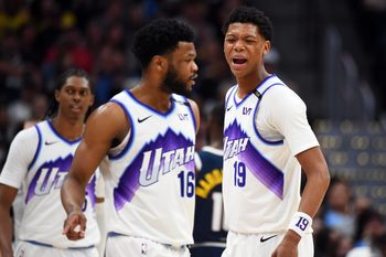 Mar 27, 2026; Denver, Colorado, USA; Utah Jazz guard Ace Bailey (19) celebrates with guard Elijah Harkless (16) during the second half against the Denver Nuggets at Ball Arena. Mandatory Credit: Christopher Hanewinckel-Imagn Images