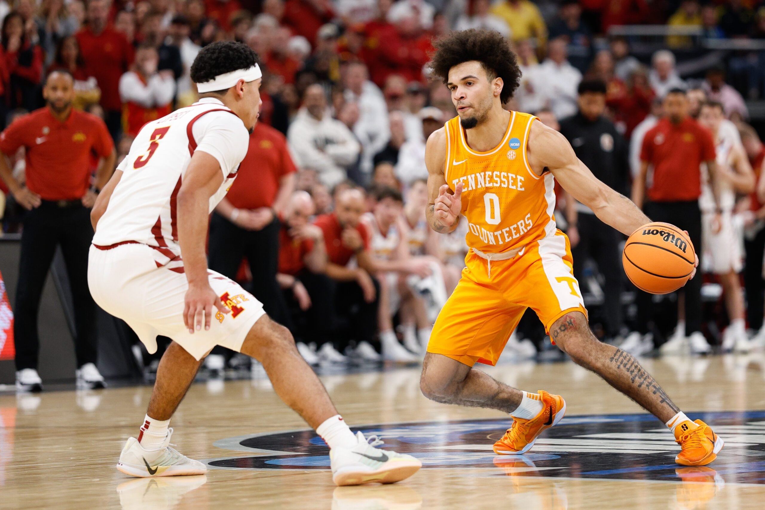 Mar 27, 2026; Chicago, IL, USA; Tennessee Volunteers guard Ja'Kobi Gillespie (0) moves the ball while defended by Iowa State Cyclones guard Tamin Lipsey (3) in the second half during a Sweet Sixteen game of the Midwest Regional of the men's 2026 NCAA Tournament at United Center. Mandatory Credit: Kamil Krzaczynski-Imagn Images