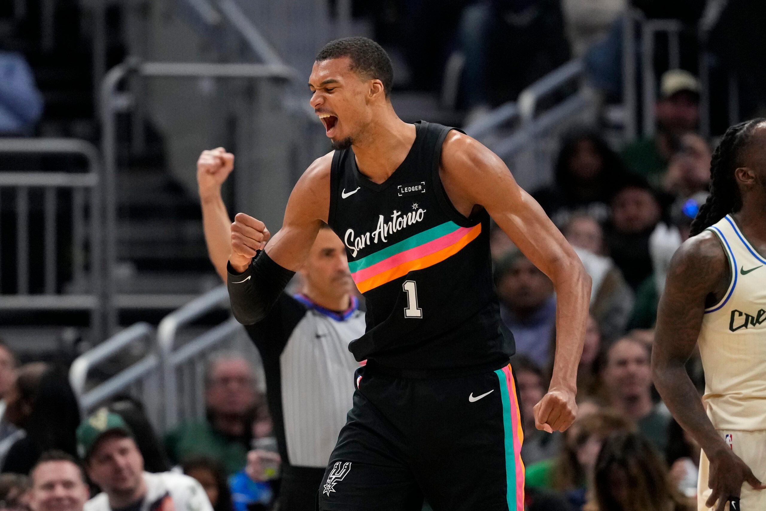 Mar 28, 2026; Milwaukee, Wisconsin, USA;  San Antonio Spurs forward Victor Wembanyama (1) celebrates after scoring a basket during the fourth quarter against the Milwaukee Bucks at Fiserv Forum. Mandatory Credit: Jeff Hanisch-Imagn Images