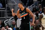 Mar 28, 2026; Milwaukee, Wisconsin, USA;  San Antonio Spurs forward Victor Wembanyama (1) celebrates after scoring a basket during the fourth quarter against the Milwaukee Bucks at Fiserv Forum. Mandatory Credit: Jeff Hanisch-Imagn Images
