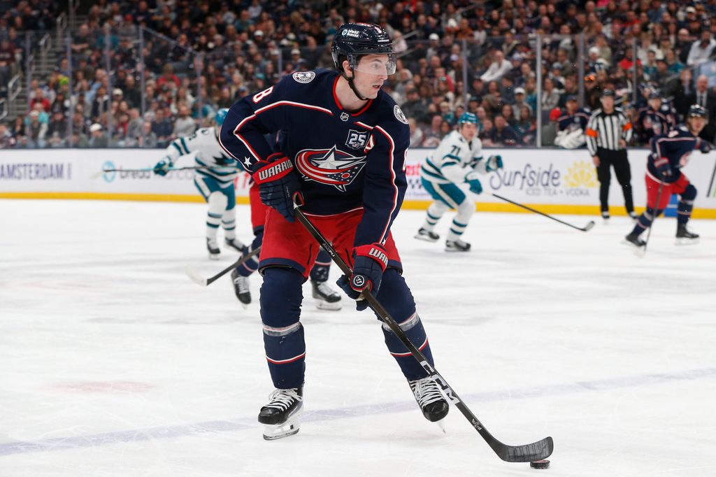 Mar 28, 2026; Columbus, Ohio, USA; Columbus Blue Jackets defenseman Zach Werenski (8) controls the puck against the San Jose Sharks during the first period at Nationwide Arena. Mandatory Credit: Russell LaBounty-Imagn Images