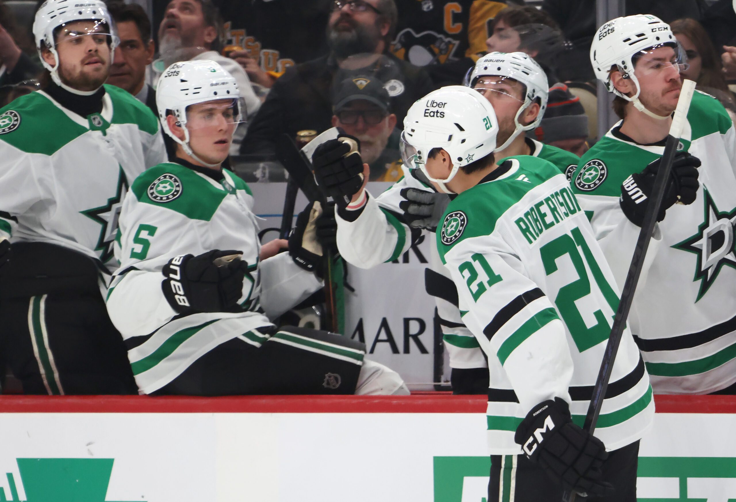 Mar 28, 2026; Pittsburgh, Pennsylvania, USA;  Dallas Stars left wing Jason Robertson (21) celebrates his goal with the Dallas bench against the Pittsburgh Penguins during the second period at PPG Paints Arena. Mandatory Credit: Charles LeClaire-Imagn Images
