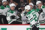 Mar 28, 2026; Pittsburgh, Pennsylvania, USA;  Dallas Stars left wing Jason Robertson (21) celebrates his goal with the Dallas bench against the Pittsburgh Penguins during the second period at PPG Paints Arena. Mandatory Credit: Charles LeClaire-Imagn Images