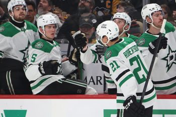 Mar 28, 2026; Pittsburgh, Pennsylvania, USA;  Dallas Stars left wing Jason Robertson (21) celebrates his goal with the Dallas bench against the Pittsburgh Penguins during the second period at PPG Paints Arena. Mandatory Credit: Charles LeClaire-Imagn Images