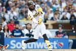 Mar 28, 2026; San Diego, California, USA; San Diego Padres right fielder Fernando Tatis Jr. (23) hits an RBI single during the third inning against the Detroit Tigers at Petco Park. Mandatory Credit: David Frerker-Imagn Images