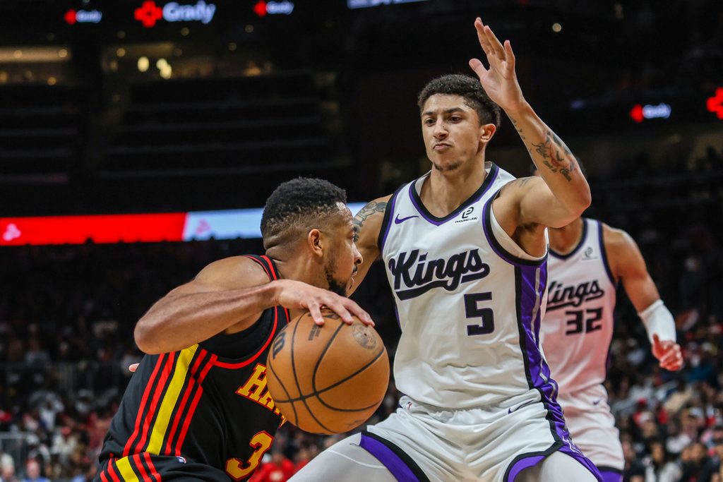Mar 28, 2026; Atlanta, Georgia, USA; Atlanta Hawks guard CJ McCollum (3) drives the ball towards the basket against Sacramento Kings guard Nique Clifford (5) during the fourth quarter at State Farm Arena. Mandatory Credit: Jordan Godfree-Imagn Images