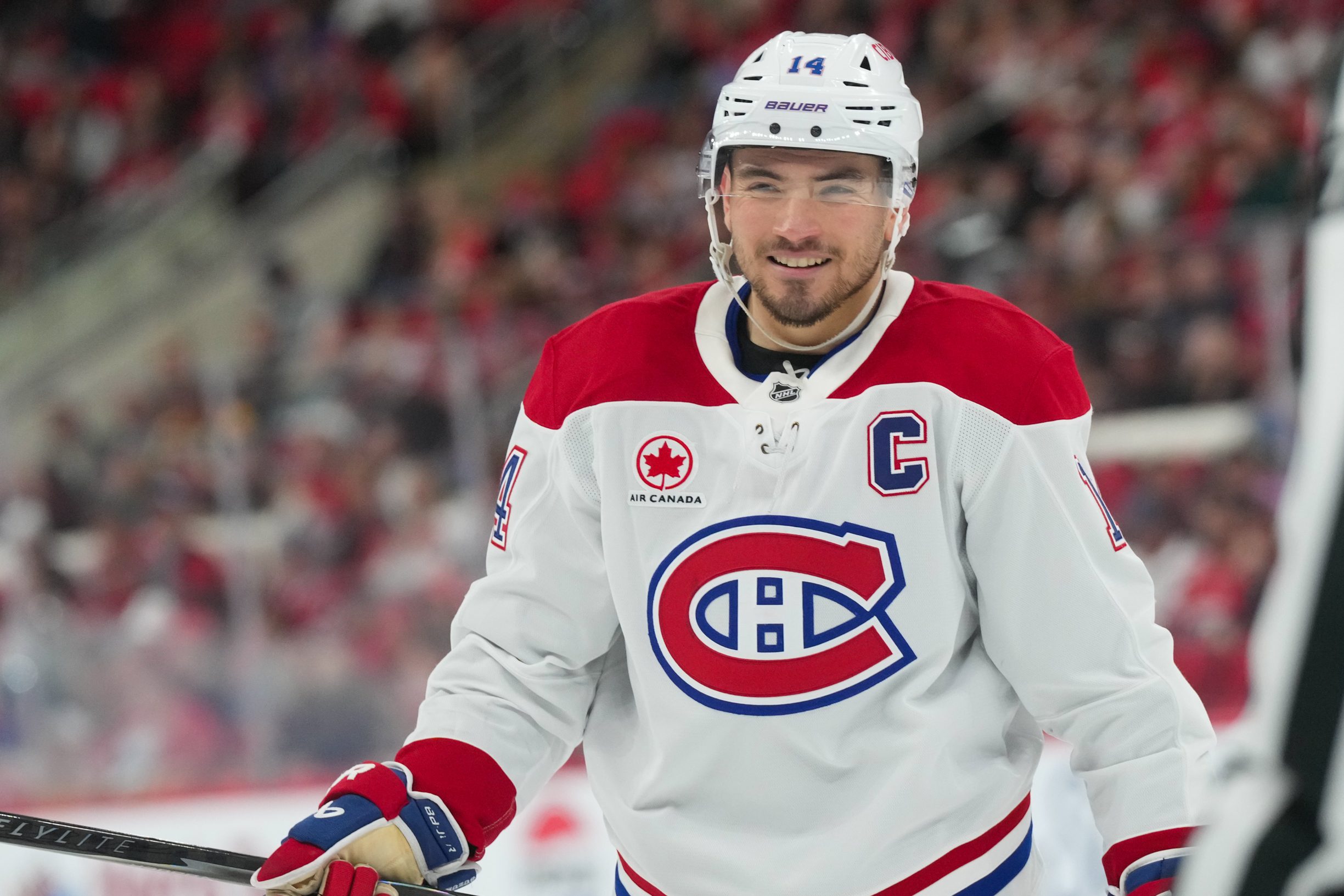 Mar 29, 2026; Raleigh, North Carolina, USA;  Montreal Canadiens center Nick Suzuki (14) reacts against the Carolina Hurricanes during the second period at Lenovo Center. Mandatory Credit: James Guillory-Imagn Images