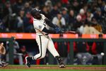 Mar 29, 2026; Seattle, Washington, USA; Seattle Mariners left fielder Randy Arozarena (56) hits an RBI single against the Cleveland Guardians during the eighth inning at T-Mobile Park. Mandatory Credit: Steven Bisig-Imagn Images