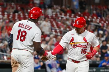 Mar 30, 2026; St. Louis, Missouri, USA; St. Louis Cardinals third baseman Nolan Gorman (16) is congratulated by right fielder Jordan Walker (18) after hitting a solo home run against the New York Mets during the sixth inning at Busch Stadium. Mandatory Credit: Jeff Curry-Imagn Images