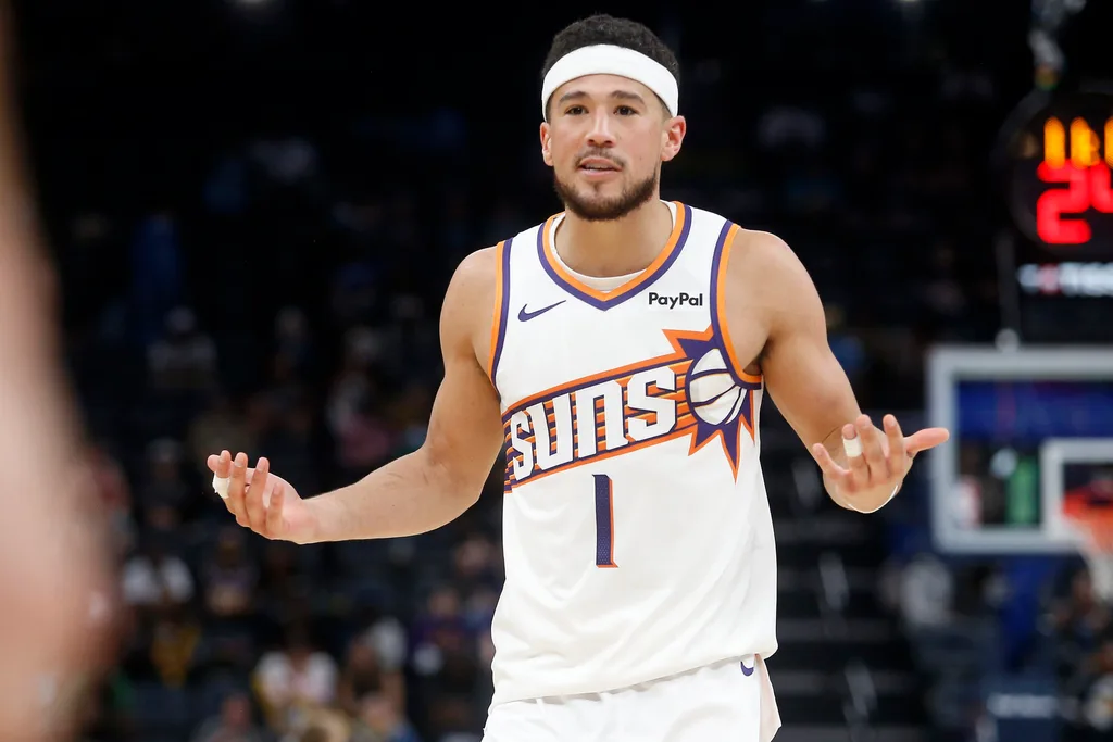 Mar 30, 2026; Memphis, Tennessee, USA; Phoenix Suns guard Devin Booker (1) reacts during the third quarter against the Memphis Grizzlies at FedExForum. Mandatory Credit: Petre Thomas-Imagn Images